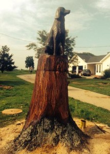 dog tree stump statue