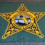 ‘In Dog We Trust’ Mistakenly Printed on Florida Sheriff’s Office Rugs