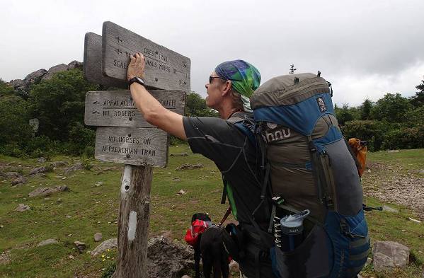 blind hiker Trevor Thomas and guide dog Tennille trail marker