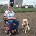 Service Dogs Help Farmers with Disabilities Do Their Jobs