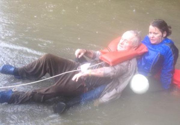 elderly man and dog rescued in south carolina flood